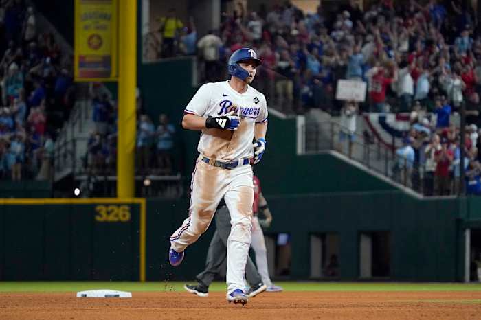 Oct 27, 2023; Arlington, TX, USA; Texas Rangers shortstop Corey Seager (5) rounds the bases after hitting a two-run home run during the ninth inning in game one of the 2023 World Series against the Arizona Diamondbacks at Globe Life Field. Mandatory Credit: Raymond Carlin III-USA TODAY Sports